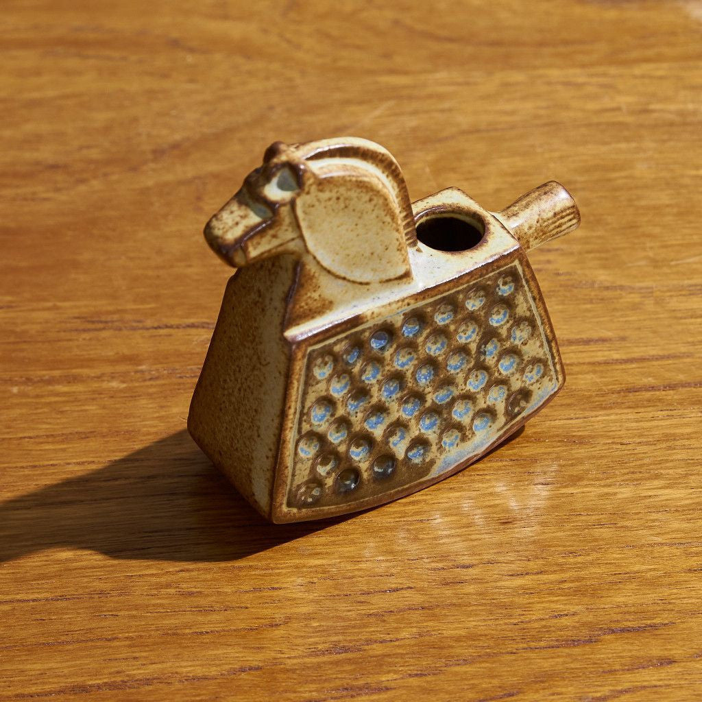 A small horse vase