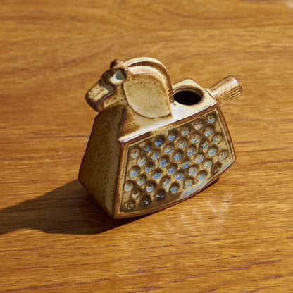 A small horse vase